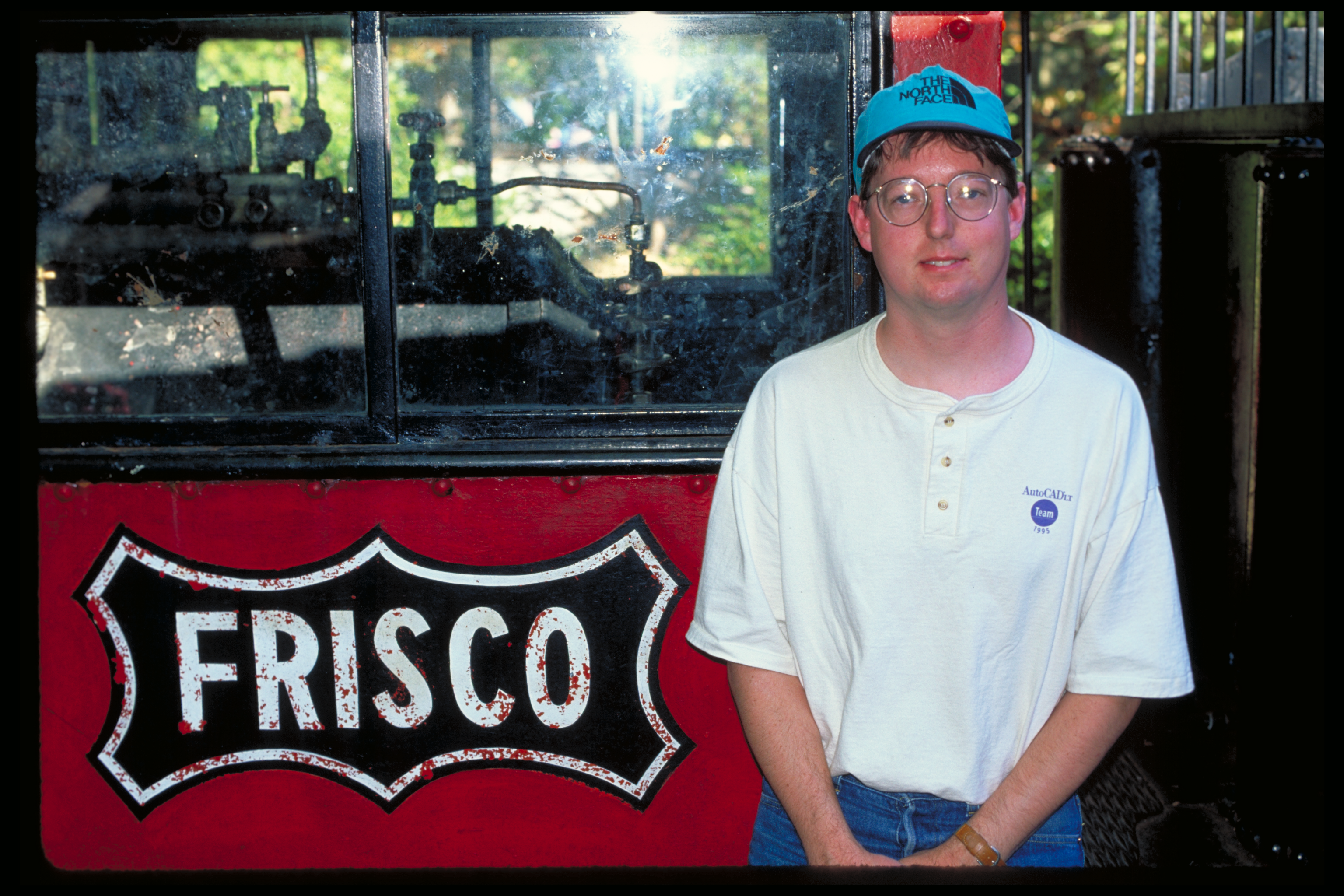 In front of a Frisco train